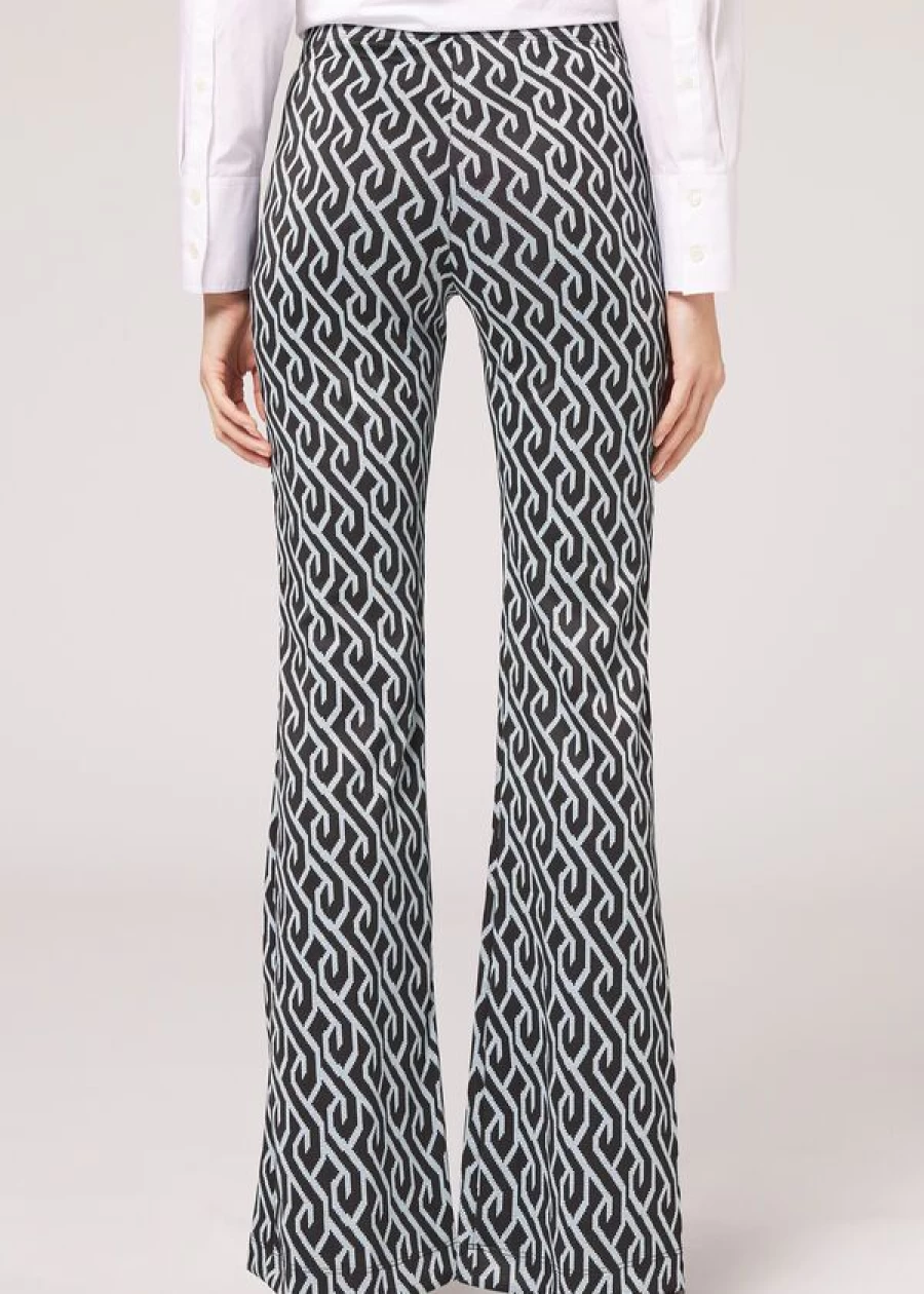 Calzedonia Geometric Flared Leggings in Black & Turquoise Glitter - Stylish Printed Yoga Pants for Women